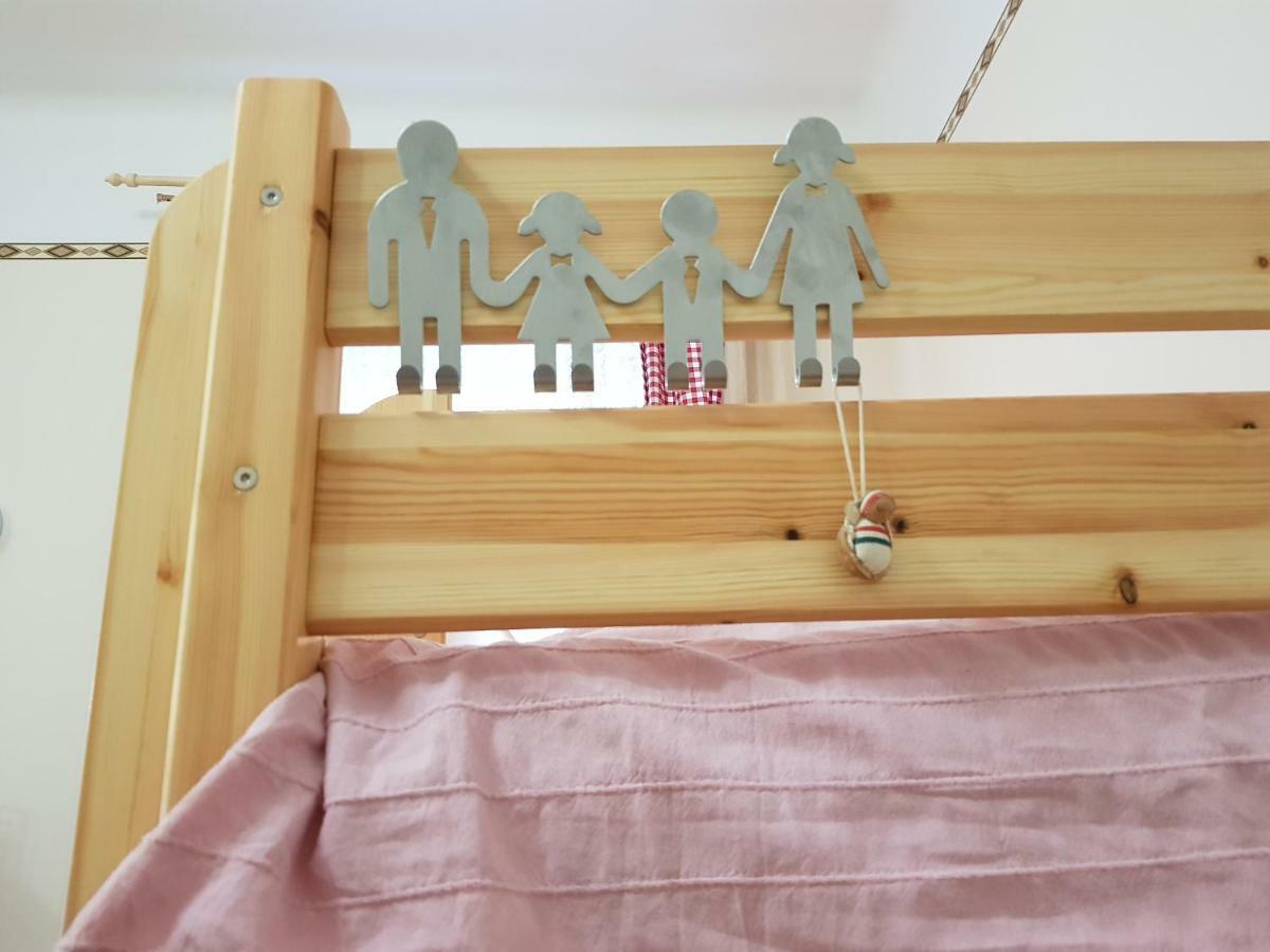 Cama em Beliche num Dormitório Misto